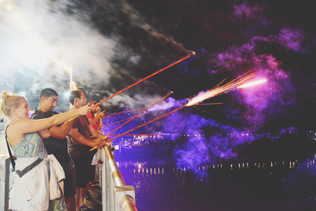 Fireworks off the bridge | When in Chiang Mai: Yi Peng Lantern Festival | lizniland.com